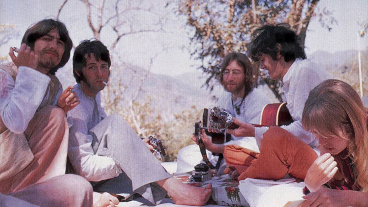 it's basically john's greek island dream come true. the beatles and their friends/fam are living in these bungalows next to each other, isolated from the world. at first things seem to go really well! they meditate and write songs together!