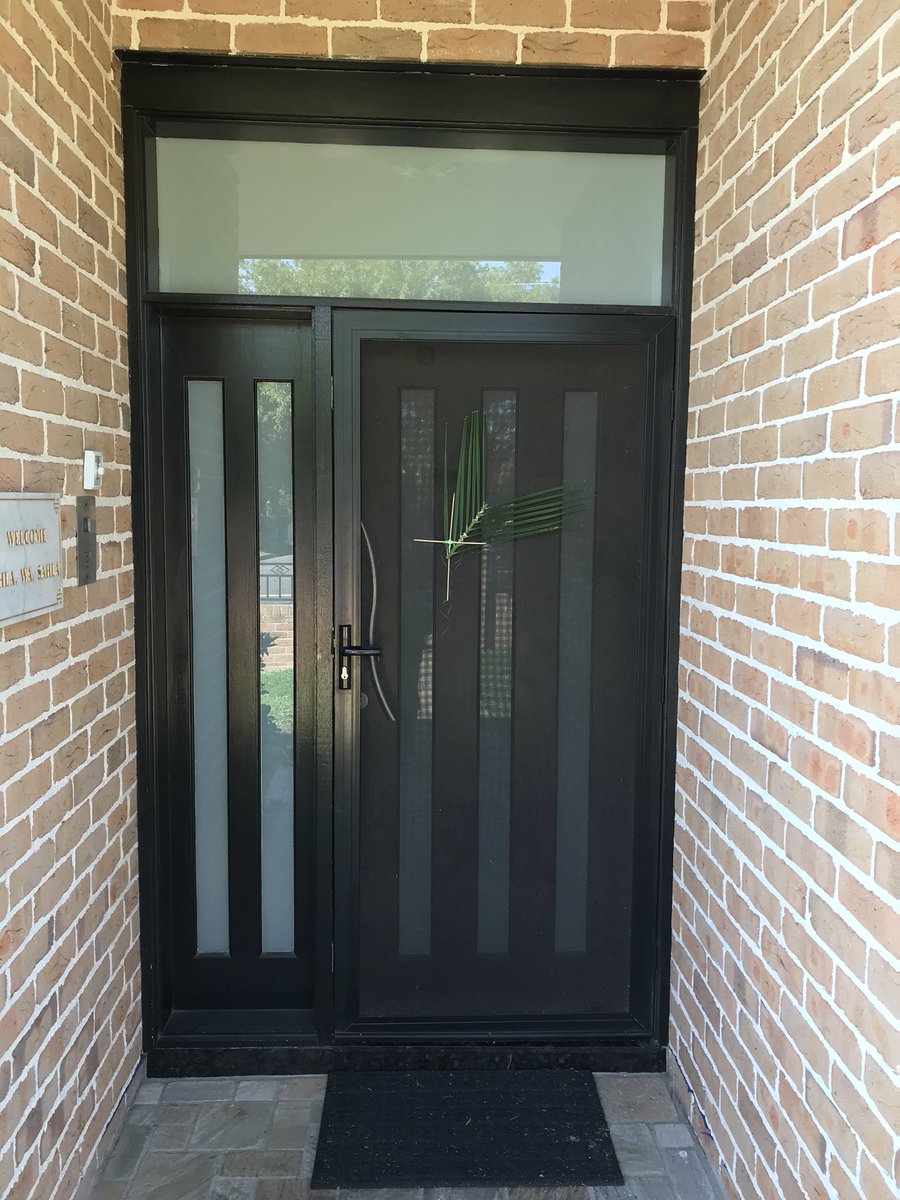 It’s going to be a very different Holy Week, but Christians united with palms on doors is a good start #unitedpalmsunday