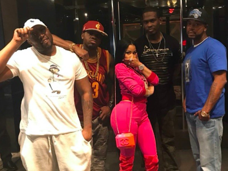 1. Nicki is stating that she’s not about the hands because she’s better & doesn’t need to fight because she has people who will handle her business. She is also referring to hanging out with real goons and professional shooters; people who are about that life that rappers boast.