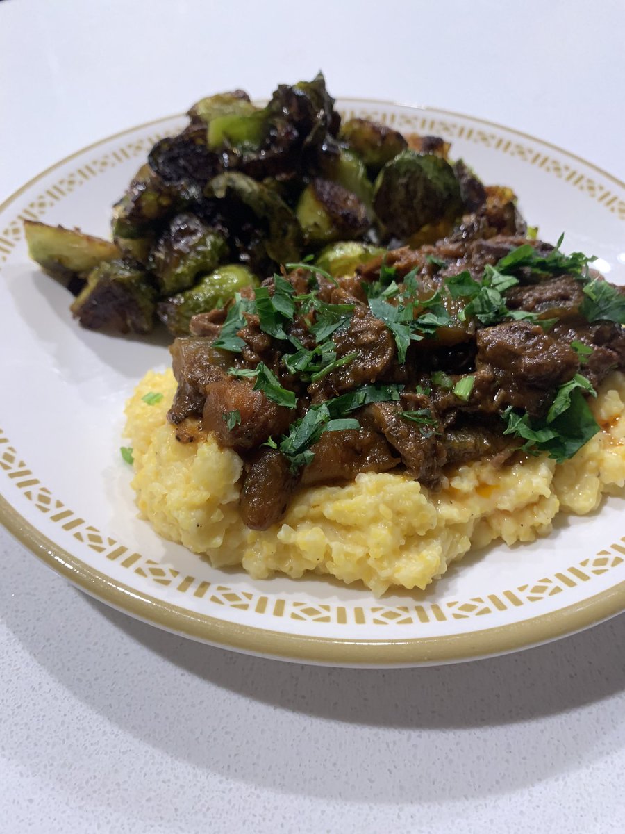 #QuarantineEats: Six hour #redWine #braised #shortRibs over #cheesy #polenta with #crispy #brussels #cookingathome #glutenfree #stayhome