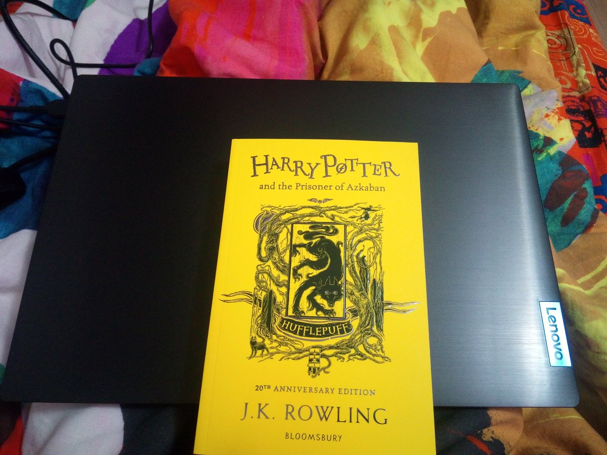 Happy I can now go to jail day to me!!!Sadly dad wasn't able to come back home this year (thanks CUNTvirus) but it's ok he video chatted with us!Honestly I'm amazed at what I got this year:Harry Potter and the prisoner of Azkaban Hufflepuff edition!and a new laptop!!!