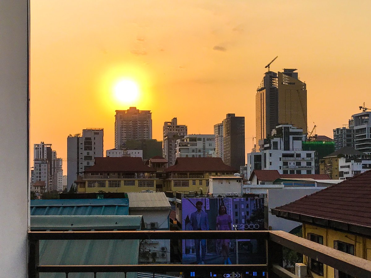Keeping it local for #SundaySunsets. Beer time and sunset last night from our flat in Phnom Penh. Keep on keepin' on all!

Tagging hosts <a href="/always5star/">Always5Star</a> <a href="/RoarLoudTravel/">RoarLoud</a> <a href="/winetraveleats/">Wine Travel Eats</a> <a href="/sl2016_sl/">Seema</a> <a href="/_sundaysunsets_/">SundaySunsets</a>
