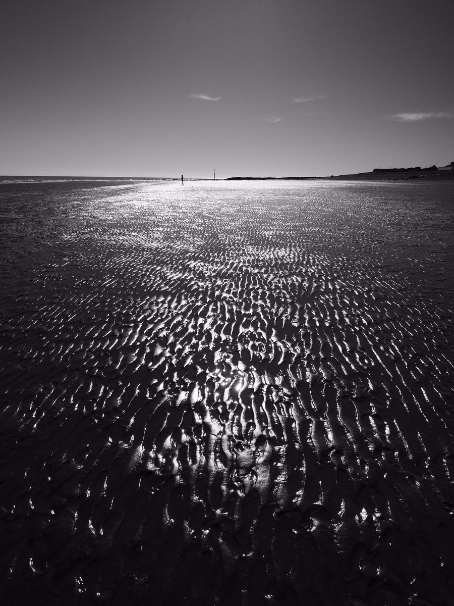 Huldrick's tweet photo. Not many people out on Bulverhythe beach yesterday. Even Suzanne did her best to keep her distance from me. https://t.co/rrZ8JVKFR4