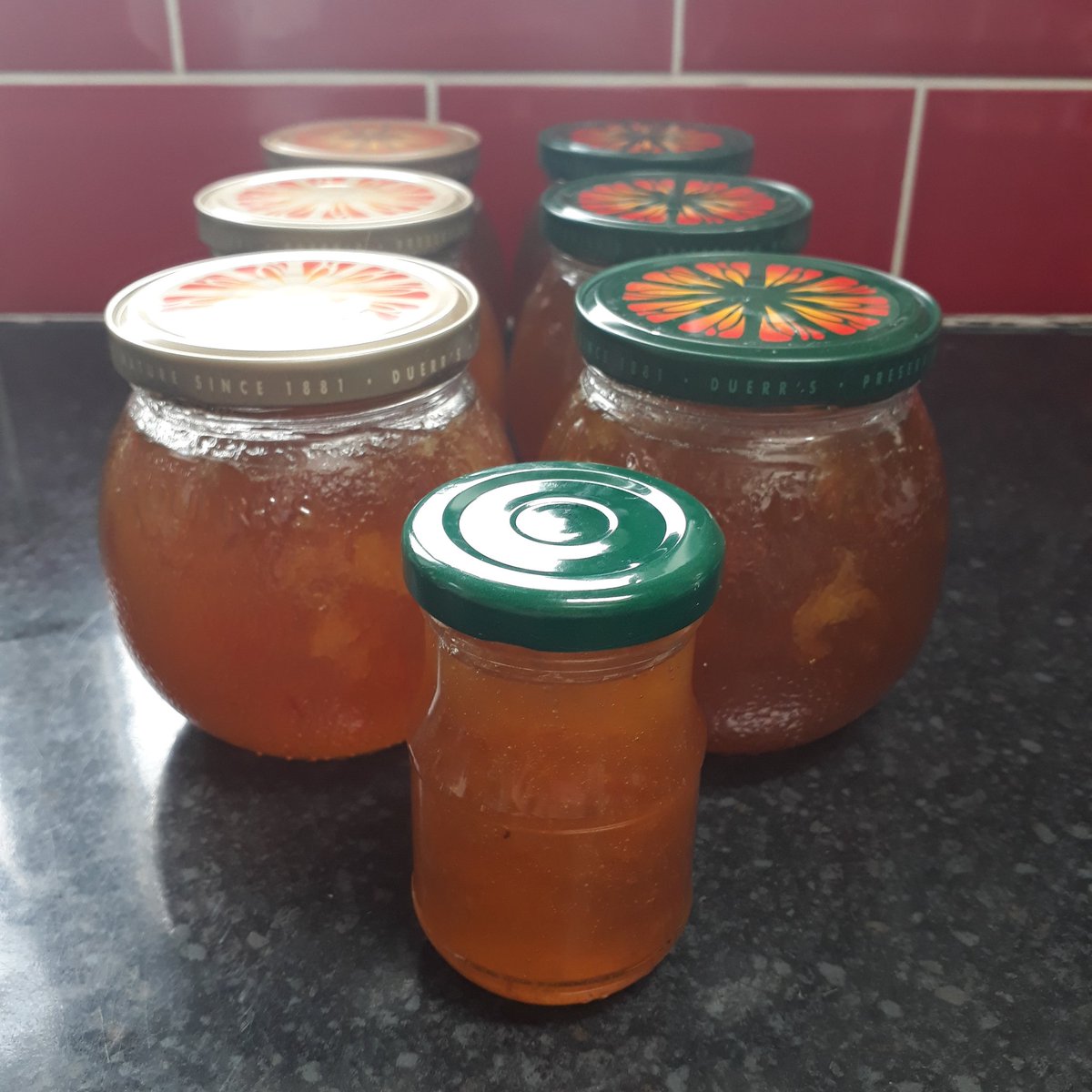 Alterknitive's tweet photo. Today I made marmalade because I found an ancient tin of MaMade in the pantry. Very satisfying to now have a half dozen slowly cooling jars. #simplepleasures #kitchenlockdown https://t.co/qEKVzrmG22