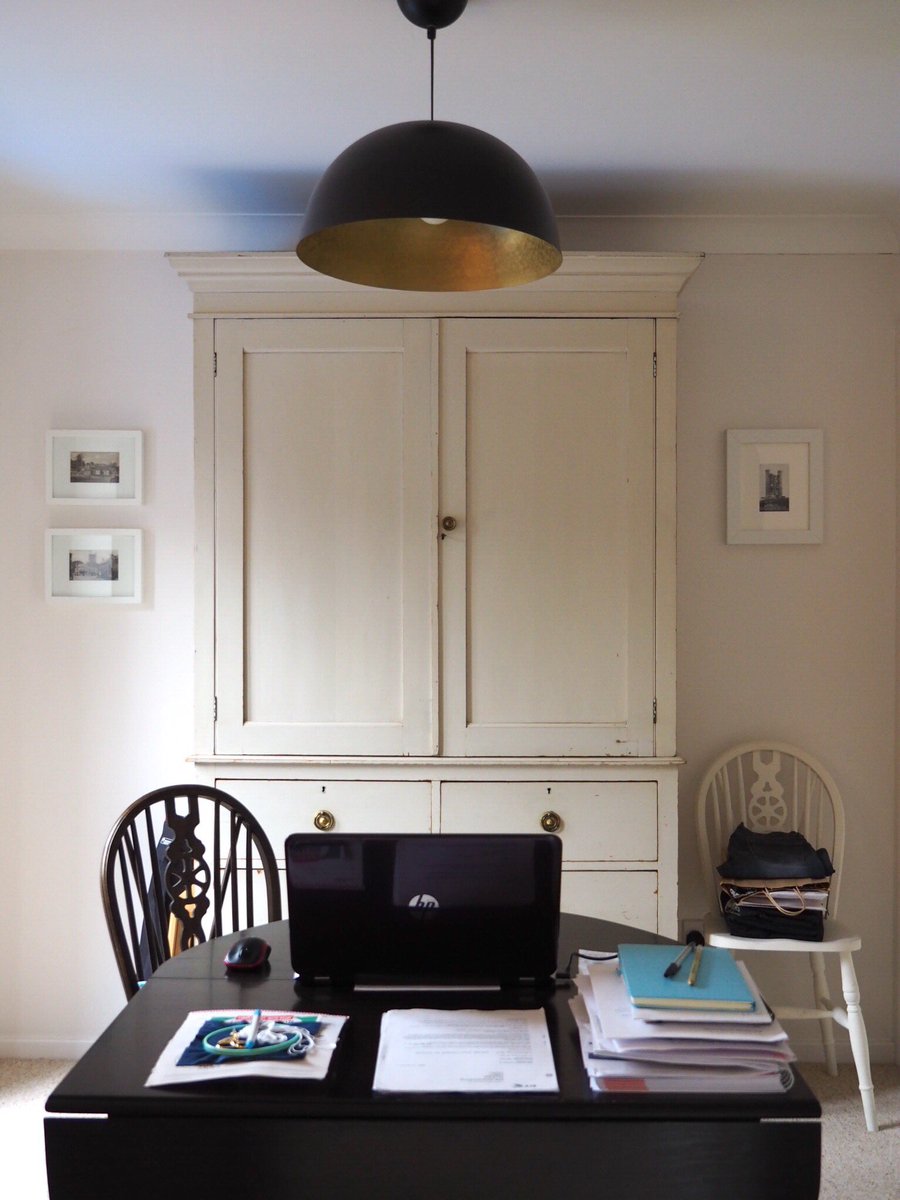 Once the Great Banquet Hall, this room has since been requisitioned as the estate office. The vintage photos either side of the Victorian linen press are of local views circa early 1900s.