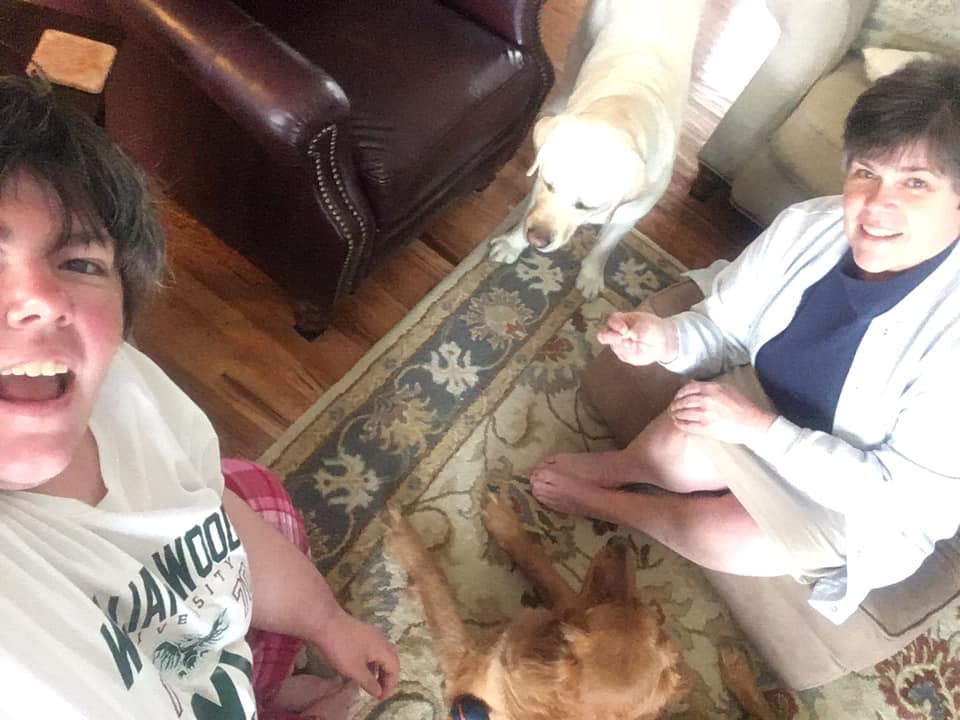 lghbshp's tweet photo. My mom (right), Trey (Yellow Lab), Sienna (Golden Retriever), and myself (left). @JeffCityStuco #SocialDistanceSunday #espiritweek https://t.co/xIoC3pVTsk