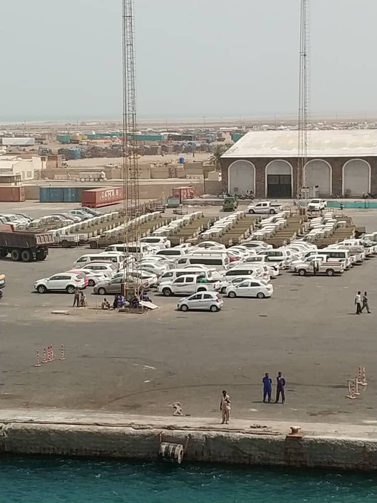 We found one picture online of about 100 vehicles lined up at Sawakin port. According to the photographer, the picture was taken from on board the Namma Express ship on 25 March 2019 i.e. just after the arrival of vehicles on the Al Karama. Could they be the same vehicles?10/