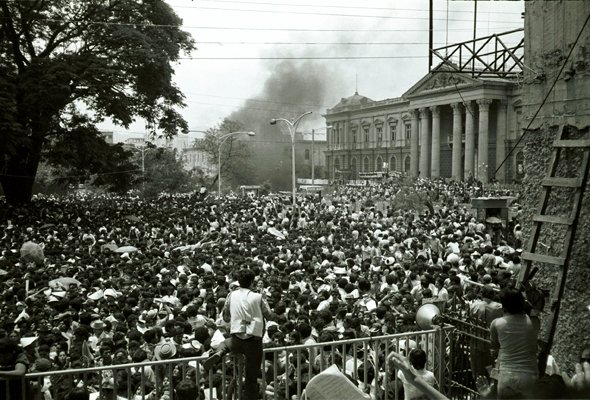 In the middle of Mass smoke bombs were thrown from the National Palace into the crowd in the square where a huge congregation had gathered. A stampede followed. Many were killed and maimed. The funeral Mass could not finish. Romero's body had to be hastily buried.