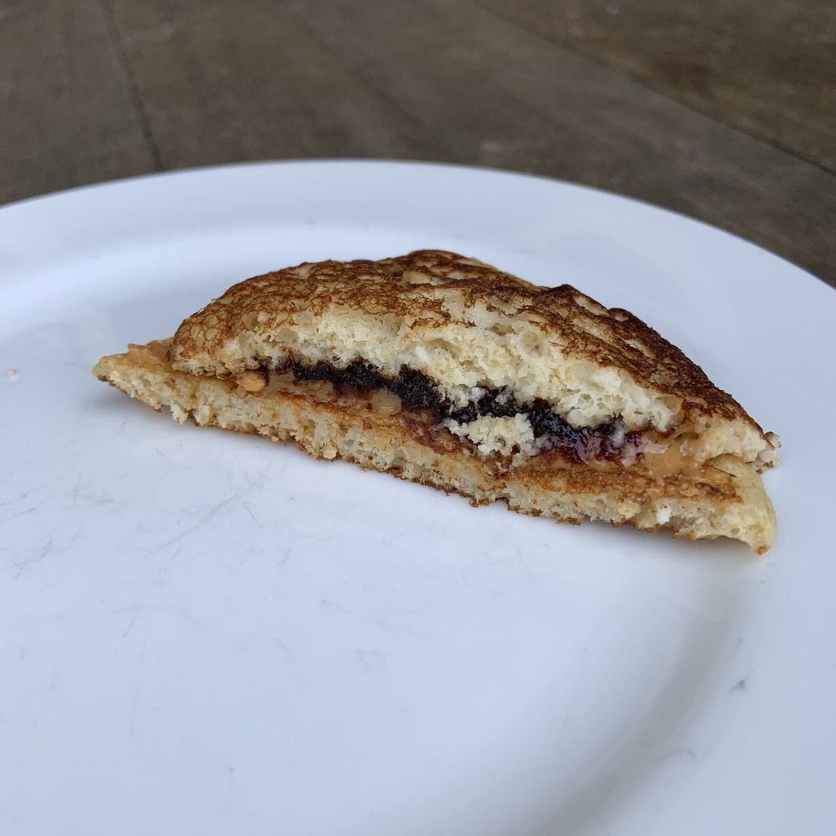 profyarrow's tweet photo. Peanut butter and Jelly on left over pancakes. #covidcooking #wastenot #wantnot https://t.co/AuA0KHQ3sl