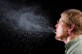 If the virus is that small, how does a mask actually help? That has to do with how the virus spreads. It spreads on the water droplets that you breathe, sneeze, or cough. These droplets are much bigger than the virus – even big enough to see.