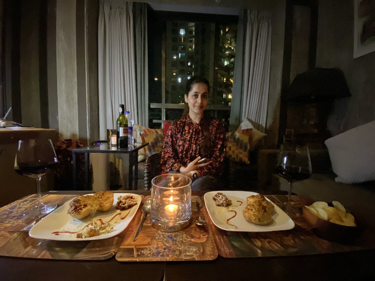 NeilNMukesh's tweet photo. That is how I celebrated my #9pm9minutes with my wife preparing jacket potatoes of international standards and me setting the perfect ambience of a quiet candle light dinner with a glass of wine. #lightforlife https://t.co/2G5vfkB3kc