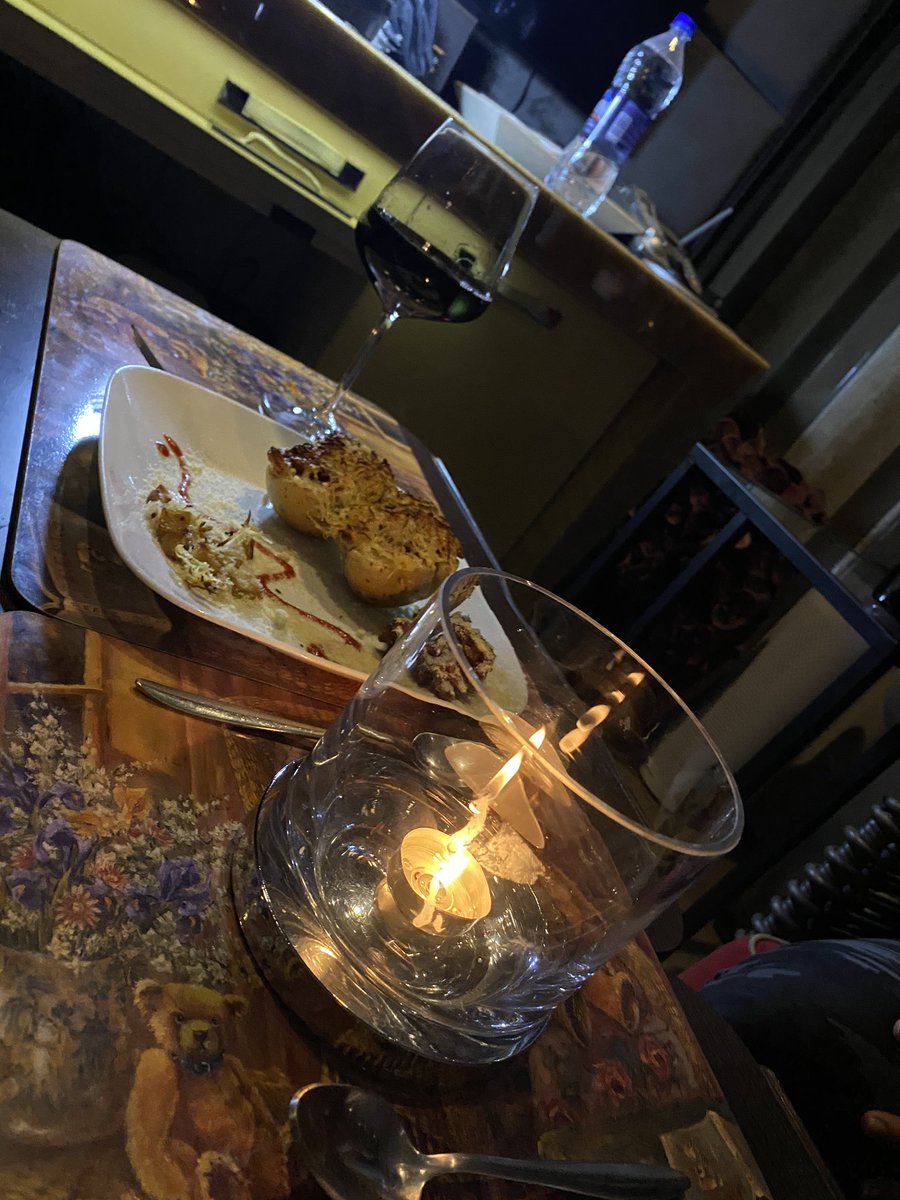 NeilNMukesh's tweet photo. That is how I celebrated my #9pm9minutes with my wife preparing jacket potatoes of international standards and me setting the perfect ambience of a quiet candle light dinner with a glass of wine. #lightforlife https://t.co/2G5vfkB3kc