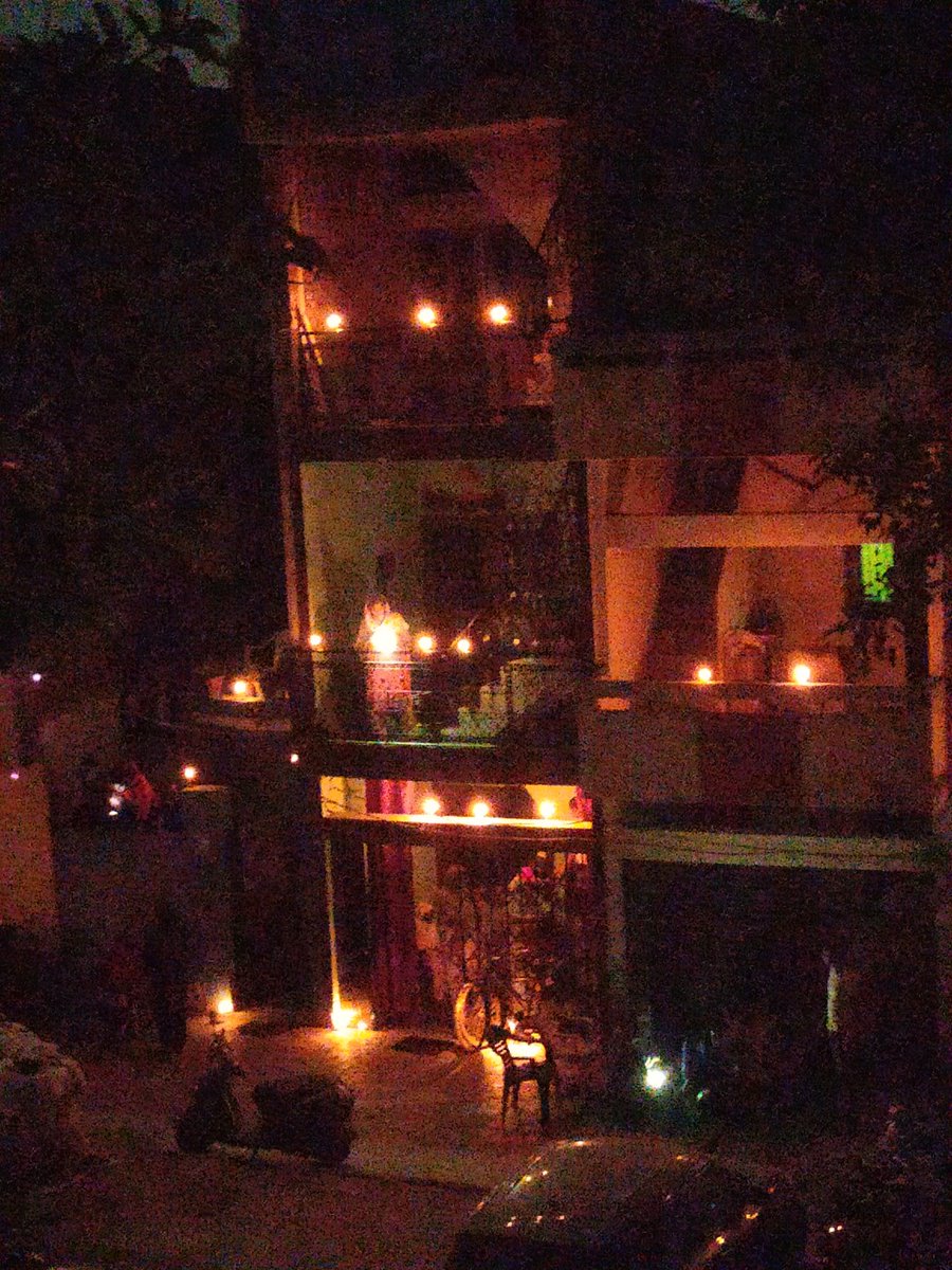 pritamdas_pd's tweet photo. In this picture two families (ground floor  Hindu, first floor Muslim) are lighting candles as a mark of symbolic solidarity during this crisis.. The most beautiful portrayal of humanity for me right now. my India😍😍... Goosebumps moment #9बजे9मिनट @narendramodi @AmitShah https://t.co/kJ4PAC3kXP