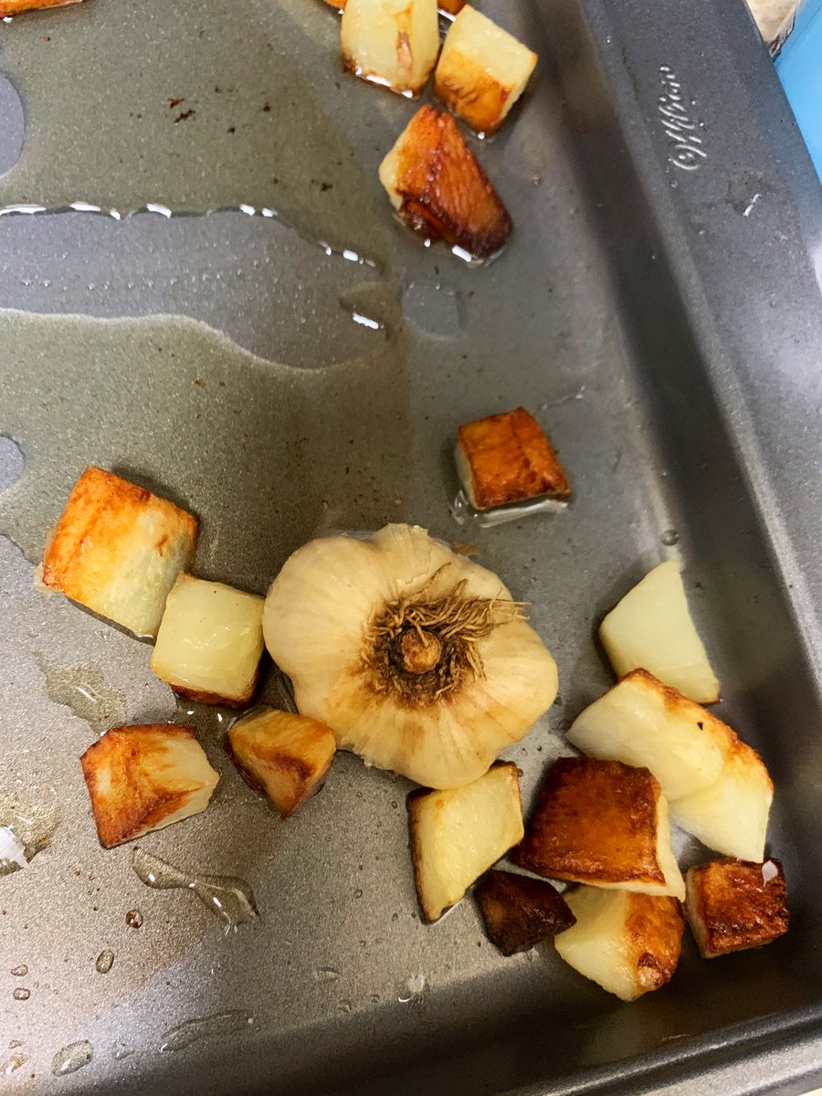 Now my roasted potatoes and 2 heads of roasted garlic gloves (I’ll just leave that autocorrect, as really, wouldn’t roasted garlic gloves be nice?) are simmering with onion, butter, white wine, and salt. Shortly they will acquire some more broth.