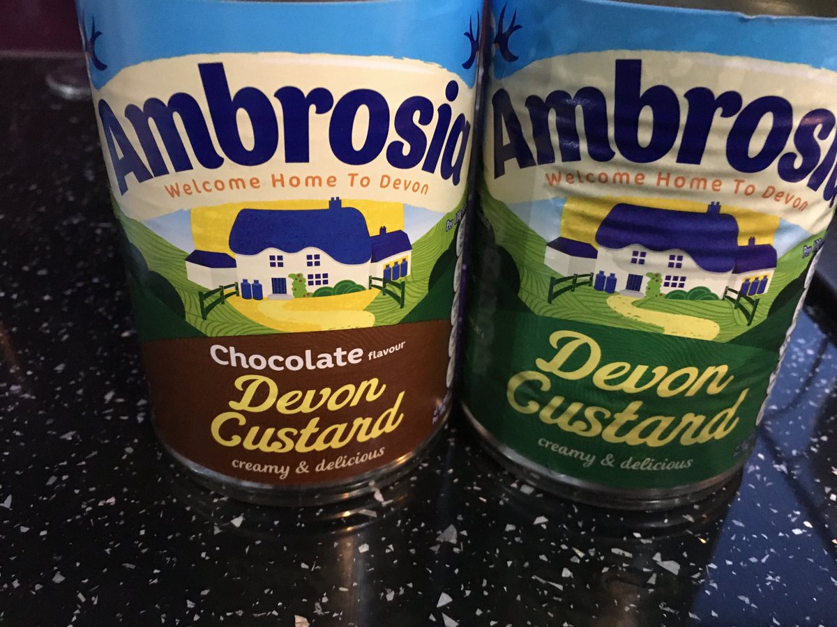 JoolsFox's tweet image. I bought chocolate custard by mistake. I didn’t notice the text, and can’t see the difference in colour. My daughter said one is green and the other brown?⁦@colourblindorg⁩