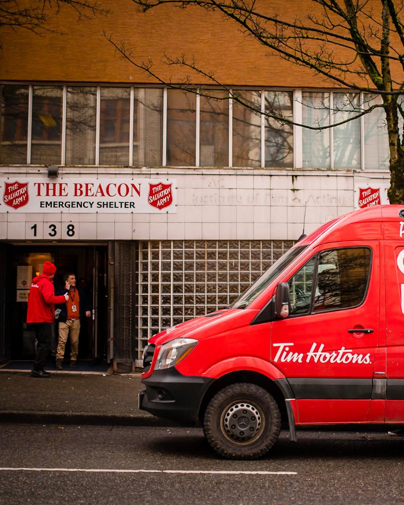 TimHortons's tweet photo. Our coffee truck brought free coffee and donuts to some of Vancouver’s essential services including Downtown Eastside Women’s Centre, fire halls and The Beacon emergency shelter, all of which are working tirelessly to support the city. https://t.co/YaoCUfx3fs