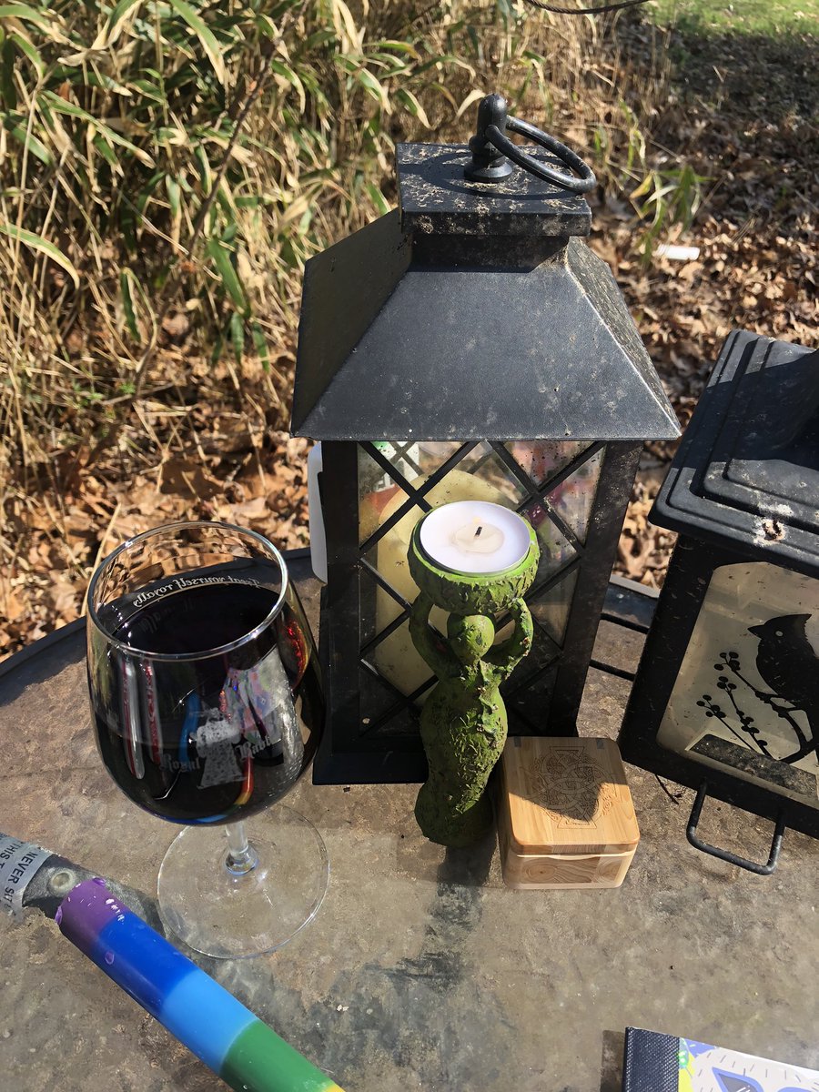 We circled the fire three times with black salt and lit the goddess candle. That’s Diet Coke in a wine glass because Diet Coke has divine feminine energy.