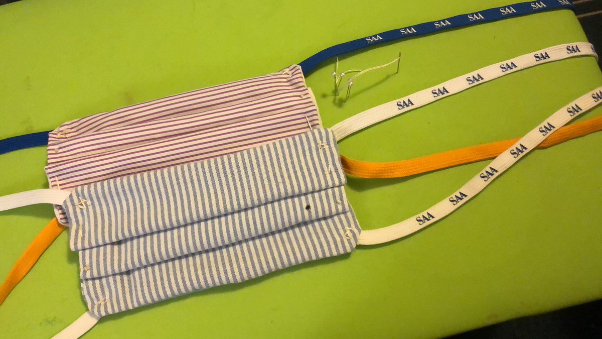 WRITAlexander's tweet photo. Homemade mask pro tip for academics: conference lanyards make great ties! https://t.co/cv8VrCWSc7