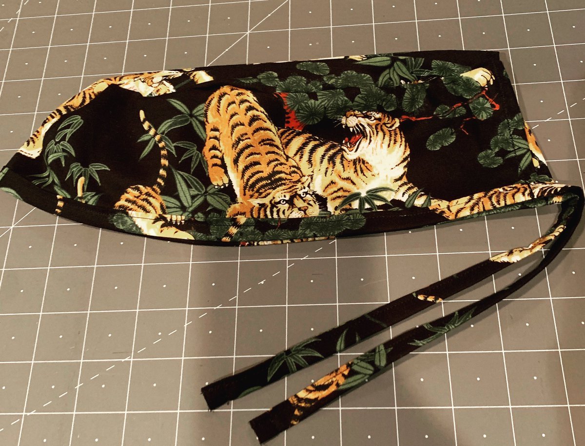 mallorywMD's tweet photo. Just finished this scrub cap for my #tigerking! And to all the other healthcare heroes out there fighting the good fight, may you continue to find joy in our calling and occasionally a little humor! https://t.co/DkxGpZqn7c