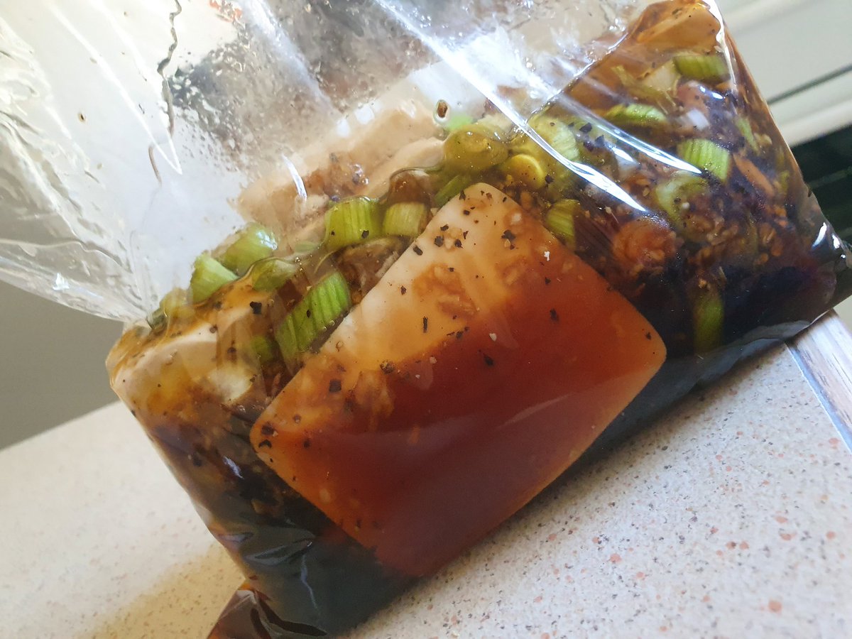 i looked up a bulgogi marinade and then sliced up tofu to soak in it. in a couple hours i'll pan sear it when im getting closer (SUMICHAGE) to serving