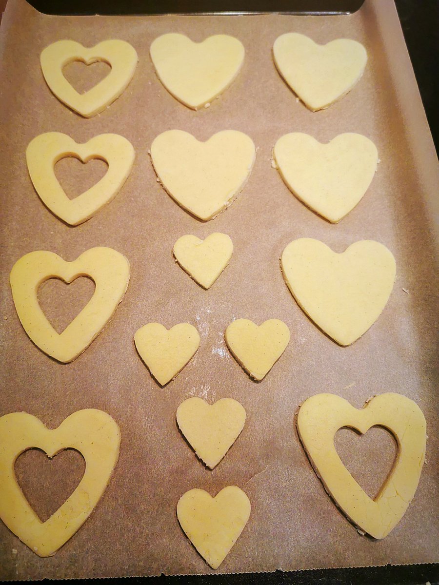 Carefully lift your biscuit shapes onto a baking tray. I chose to keep the little cut out heart shapes, because they see nice to dip in coffee when you need a little boost. But you can just roll the cut-outs back into the mixture if you prefer.