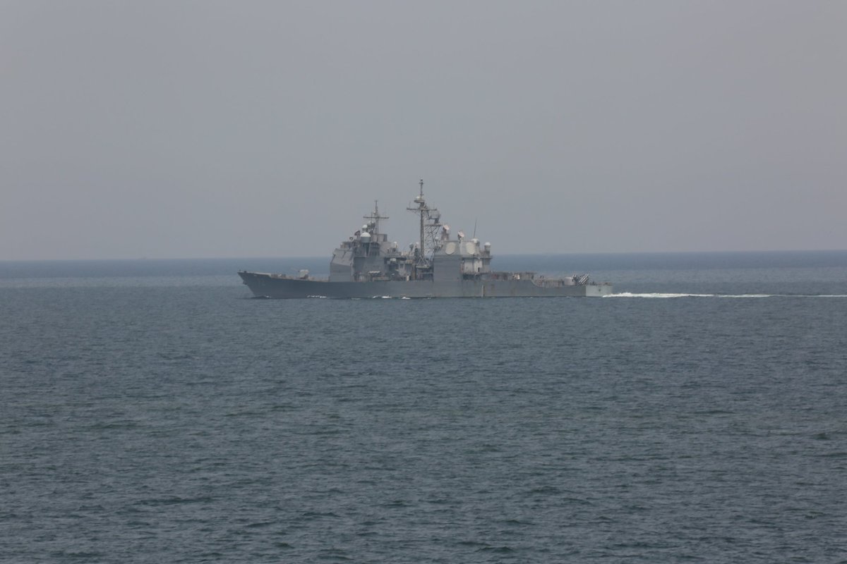 The Ticonderoga class guided-missile cruiser USS Vella Gulf  #CG72 from the USS Eisenhower  #CVN69 CSG transits the Strait of Hormuz supporting the amphibious assault ship USS Bataan  #LHD5 on April 3, 2020.US Marine Corps photo by Cpl. Gary Jayne III.