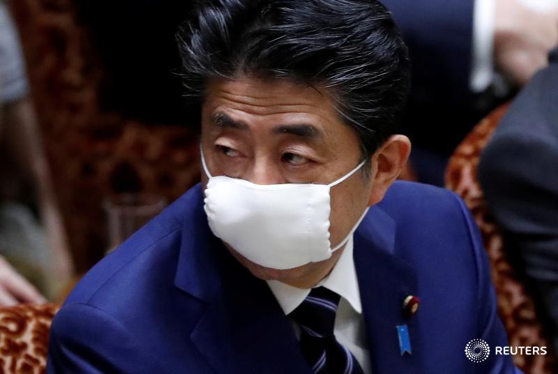 Reuters's tweet photo. 'Lockdown', Japan-style: Prime Minister Shinzo Abe is poised to declare a state of emergency over the coronavirus. Here’s what you need to know https://t.co/PMrIVpgH4P Follow the latest news on coronavirus with our live blog: https://t.co/7MRqjimlF1 https://t.co/Zgj4Iapbpq