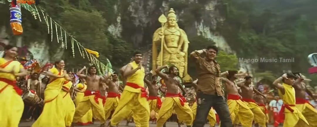 Seval Kodi Parakkudhada song from Billa movie. This song was shot in Batu Caves, an important cultural site for Malaysian Tamils. This song penned by Pa.Vijay desanskritises Murugan and celebrates the Tamil traditions surrounding Murugan worship