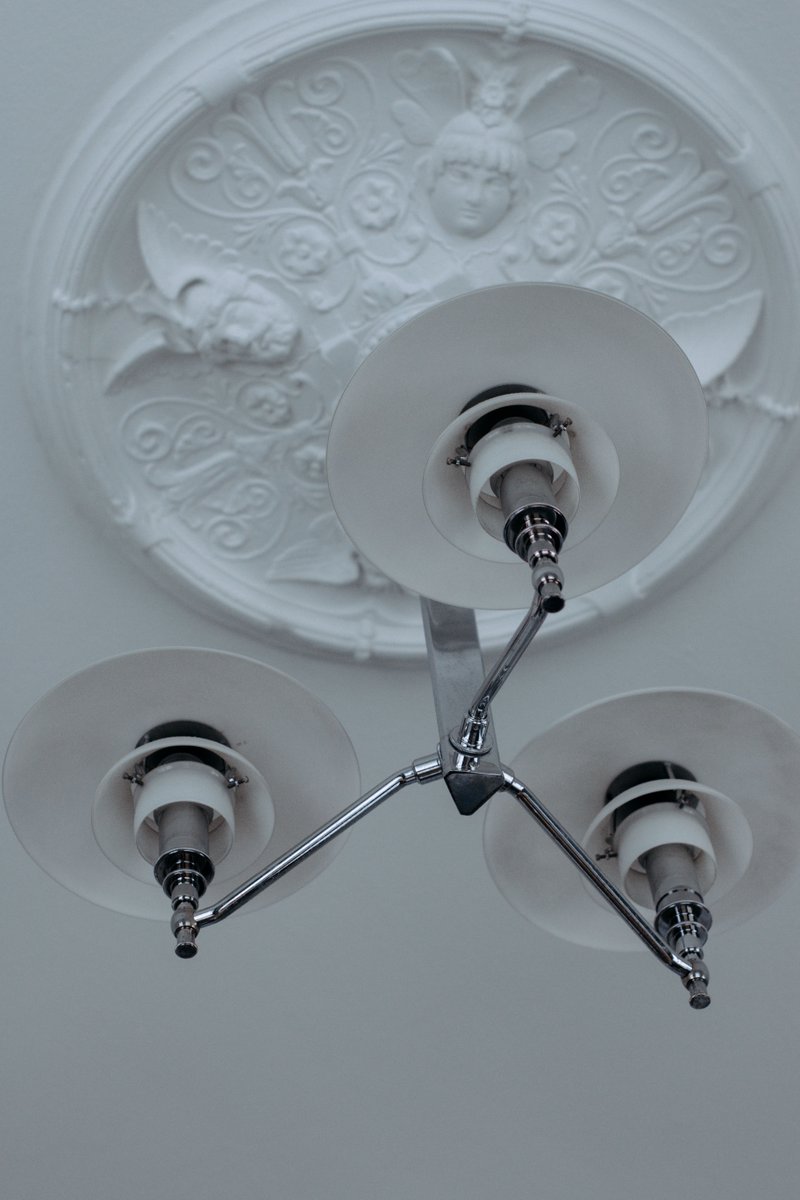 PH 3/2 Academy 

Developed in 1920s by Poul Henningsen based on a three-shade system for the PH Lamp Family designed for a large exhibition hall in Copenhagen, Denmark called "Forum". The PH 3/2 Academy pendant has become a timeless and permanent "character" in many danish homes.