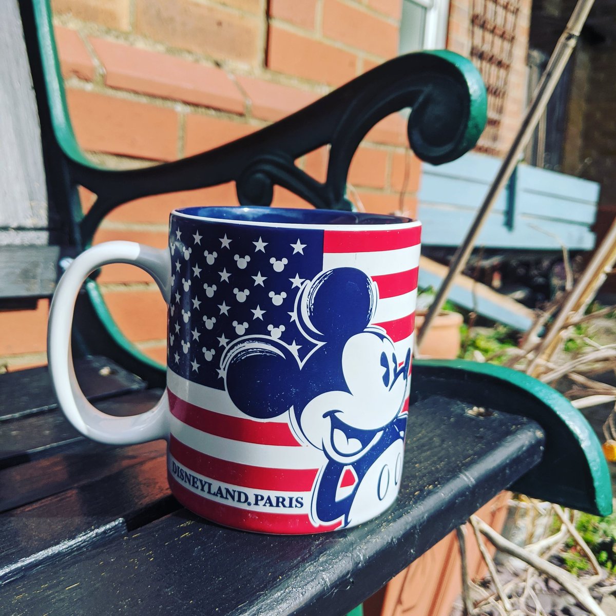cafe_eddie's tweet photo. Missing your coffee at Eddie's this Monday morning? Me too! Here's my favourite mug - souvenir of a family trip to Disney back when we were allowed to travel! Send us a photo of your favourite mug. Keep safe x https://t.co/ArUhPHnSla