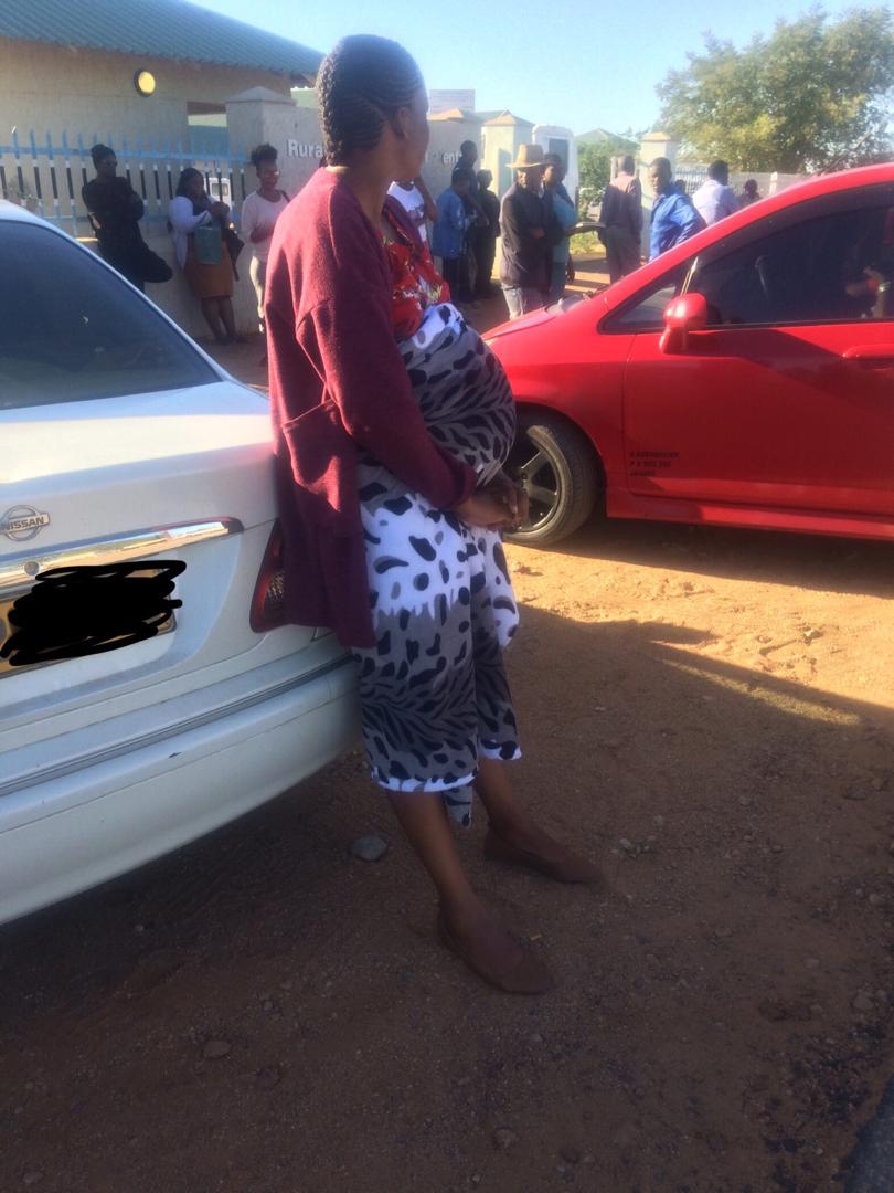 While on the line this lady (picture taken with her permission) arrives.she too has had to U-turn at Sese checkpoint because like us,she was assured that doctor's appointment letter would suffice.she is due anytime and had to travel to be admitted for delivery