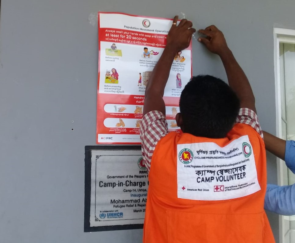 BDRCS1's tweet photo. #InformationIsAid. #Bangladesh #RedCrescent, along with Govt., re-purposed their joint Cyclone Preparedness Programme (CPP) Camp Volunteers to raise awareness on #coronavirus in #Coxsbazar camp area which has a population density of 40,000 people per sq. km. #LeaveNoOneBehind https://t.co/447F8Zv6l9