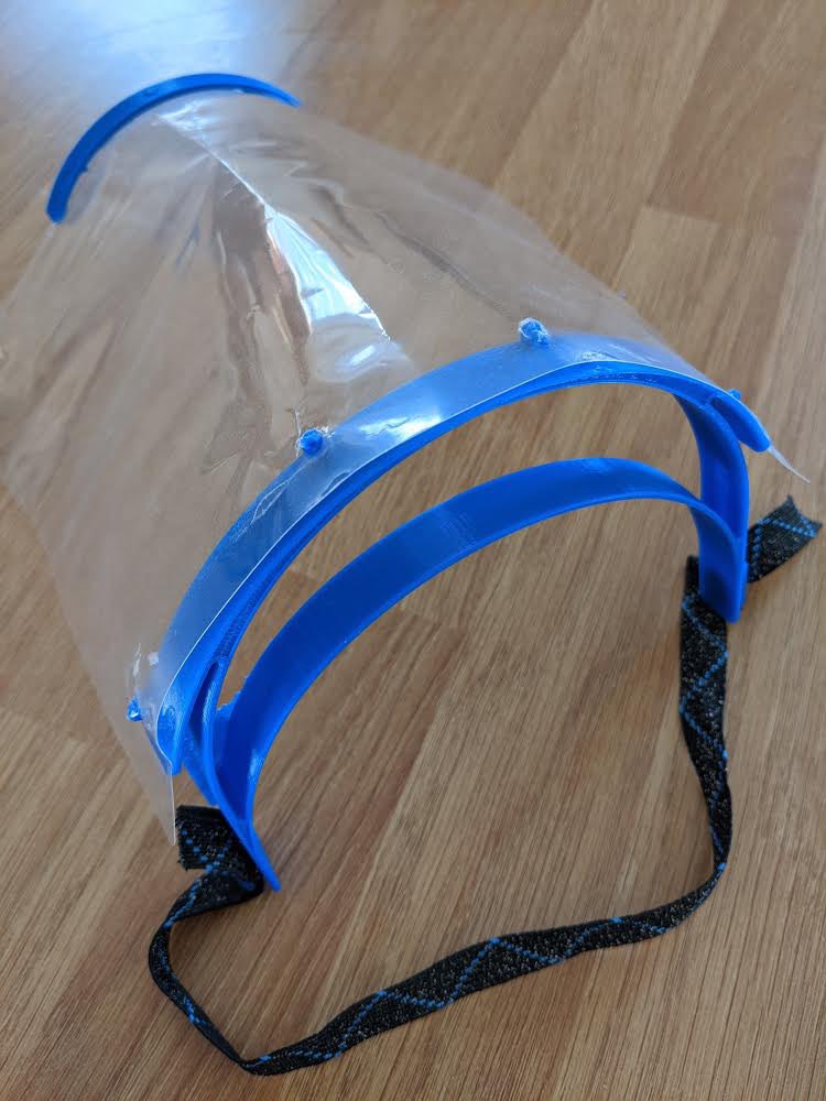 YPantSchool's tweet photo. Inspired by our very own Mr Beckett, Sam Griffiths (Year 7 student) has been experimenting with making his own PPE using his 3D printer at home. A very thoughtful young man that reflects the ethos and community spirit of our area and school. #SupportTheNHS https://t.co/QkHX6cpxaC