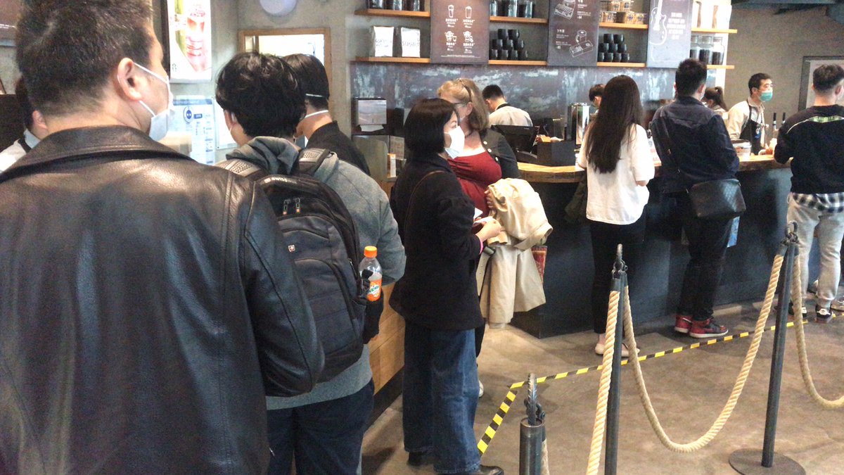 ...for a non-working day.When I got to Sanlitun it was absolutely packed with people, with 29 customers in Starbucks (left) in the downstairs area and line of 9 people in line ahead of me. Still, except for cafes and food places, and of course the Apple store (right), where...