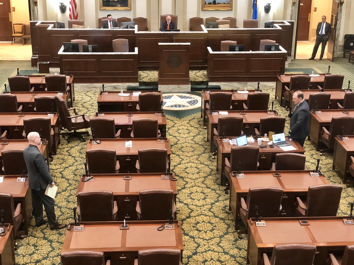 Rep. Kevin West (left) asks Echols if the  #okleg has any direct oversight. Echols says a committee exists and Speaker McCall has appointed Rep. Stan May & Rep. Chris Kannady. (Speaker PT Harold Wright is presiding while Rep. Tom Gann observes from the door.)