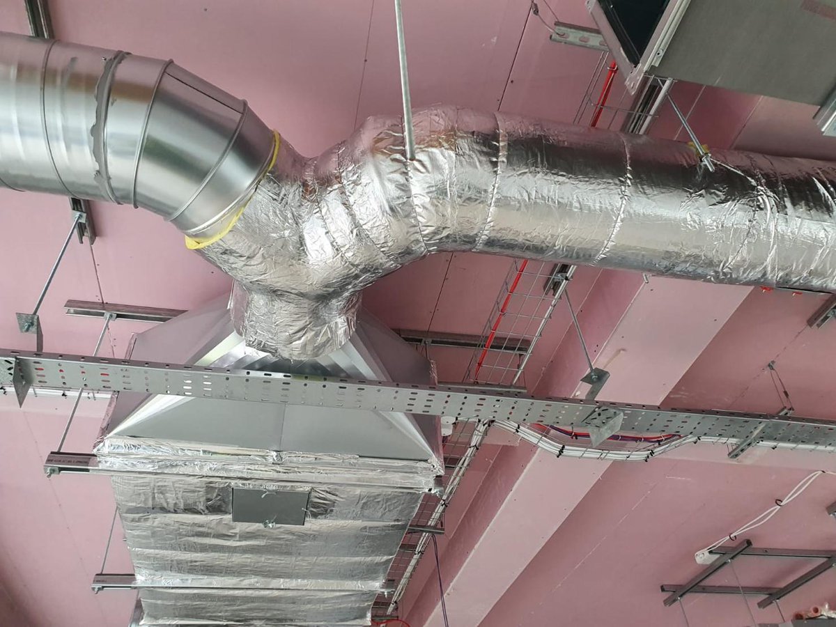 SafeguardGroup1's tweet photo. Little photo update of our project down at @wellesprimary  Our team are busy installing and lagging the fresh air and extraction duct work and installing fire rated duct work as well as installation of air conditioning to the new primary schools kitchen and hall. Good work team! https://t.co/c48KsjZasL