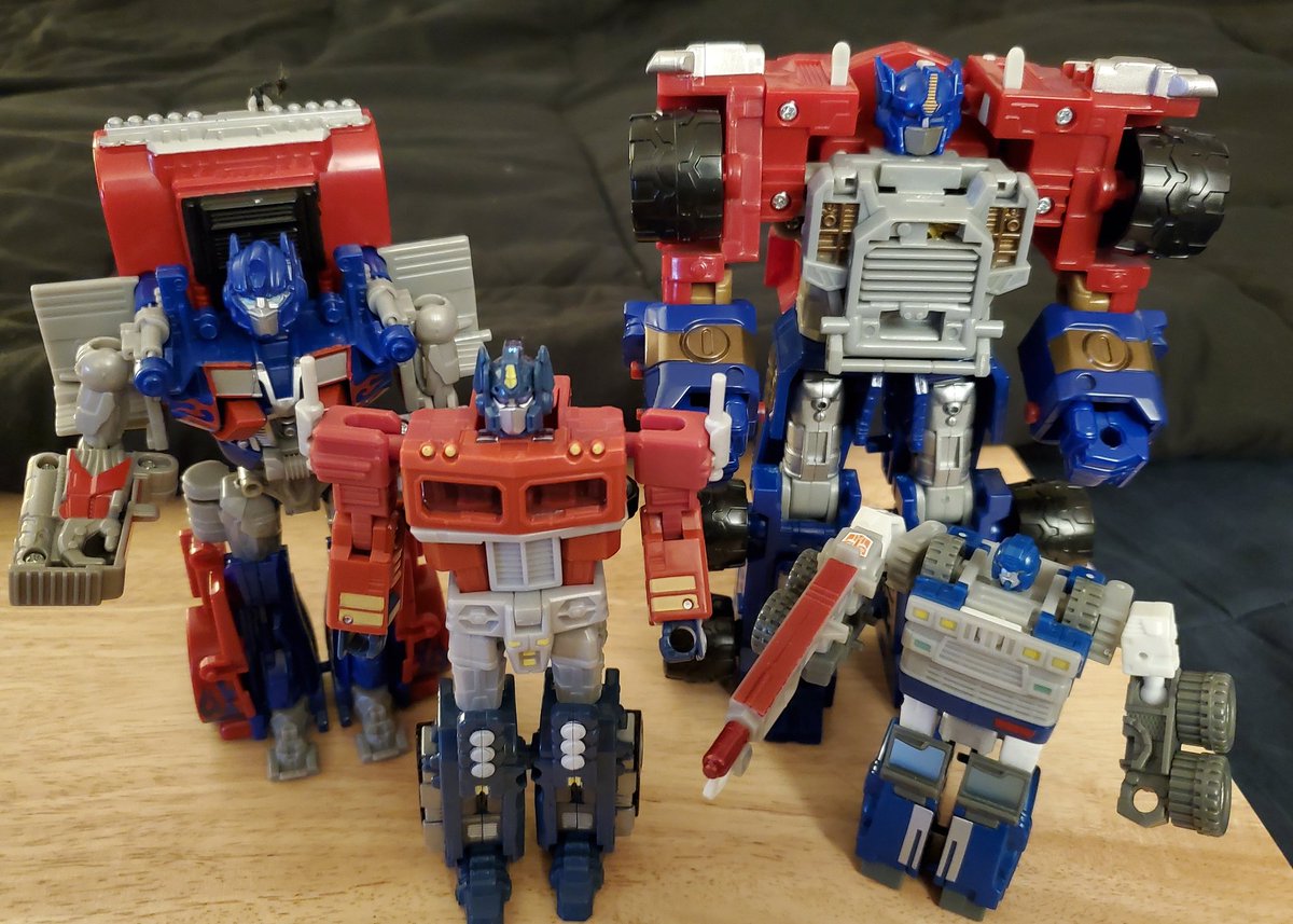 Okay, this will be my "I dug out my decade old Transformers collection" thread, so mute it if you don't wanna see that stuff.Let's start with the boring trucks, which means Optimus and also some random tow truck.Biggest Optimus best Optimus.