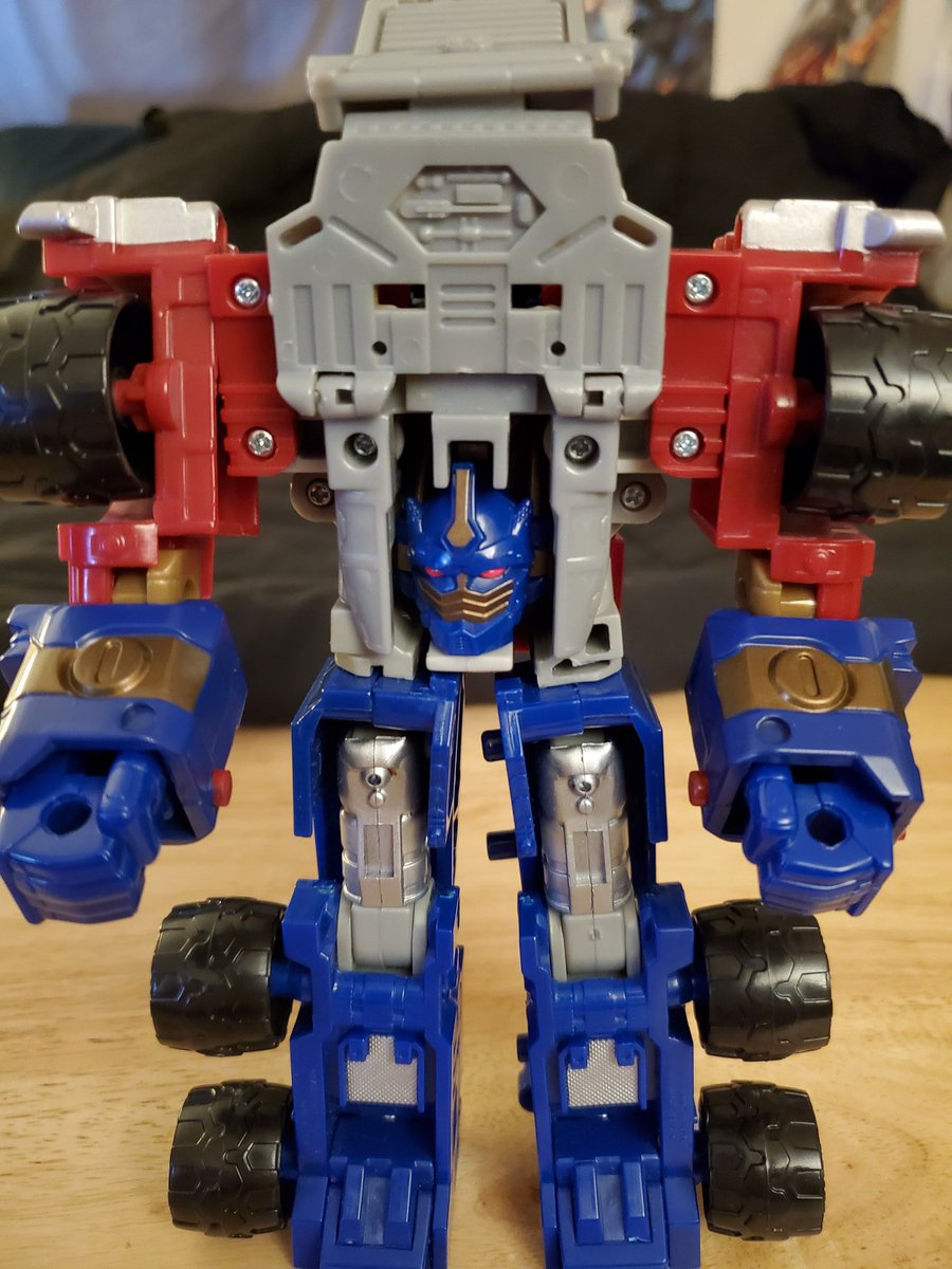 Big Optimus also had this alt mode where he becomes a top half. As I recall, he could either combine with his trailer or I wanna say Jetfire? Either way, don't have Jetfire and the trailer is long gone, so it's just a horrifying... Thing.