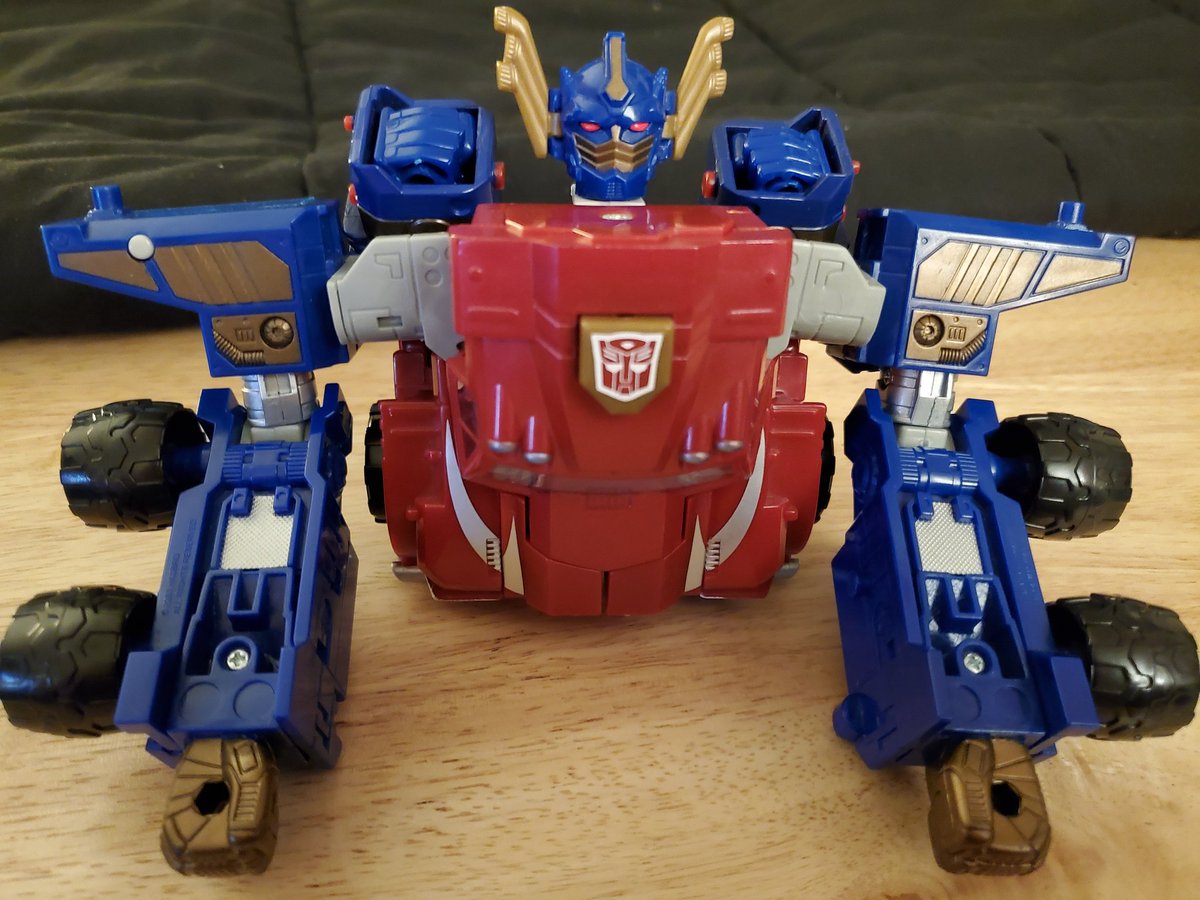 Big Optimus also had this alt mode where he becomes a top half. As I recall, he could either combine with his trailer or I wanna say Jetfire? Either way, don't have Jetfire and the trailer is long gone, so it's just a horrifying... Thing.