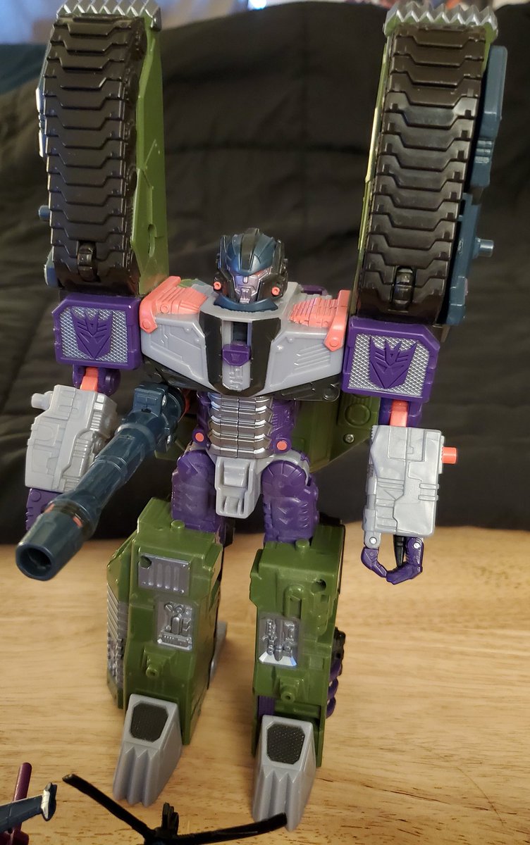 Some of the minicon robot modes are really doofy looking.Megatron is not pleased I lost his dorky horns as a child.