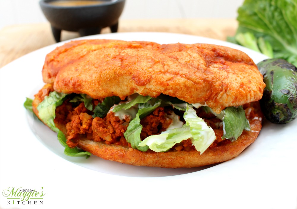 maggieunz's tweet photo. A Pambazo is a mouthwatering and tasty sandwich. Bread dunked in a guajillo chile sauce and stuffed with Mexican chorizo and potatoes. Delicious and flavorful with every bite! Video + Recipe >> 
https://t.co/EFvwFpivJ1 #mexicanfood #mamamaggieskitchen https://t.co/GLH41c5x7c