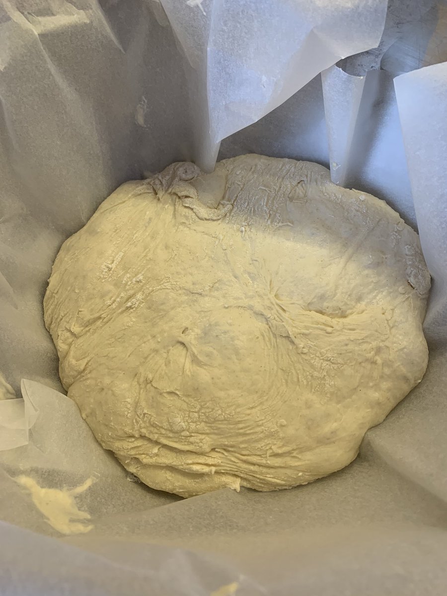 Now fold it back on itself about four times to form a soft ball of dough. Line a bowl with grease proof paper and carefully pop the dough in to that. Cover with a towel and let it rest for 15 mins.