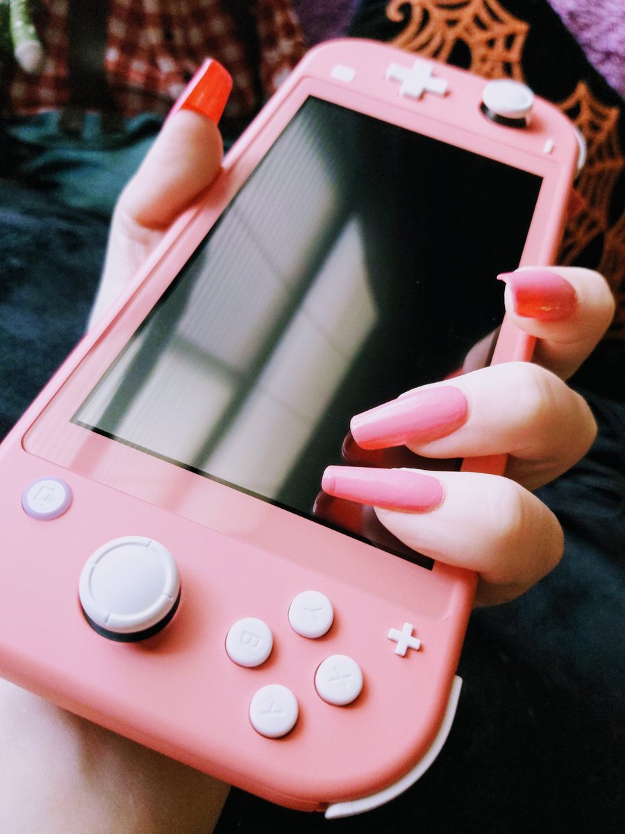 nukacherrry's tweet photo. She's hereeeeeee!!  💗 If anyone needs me, I'll be devoting the rest of my life to piling up my debt to Tom Nook!  #nintendoswitch #nintendoswitchlite #coralswitch https://t.co/kgN1VEK2EJ