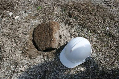 11/ Some of these boulders flung into the fence were quite large. This one is as big as my hard-hat. Some were 3x bigger. (You had to be careful picking them up, since fire ants usually made their nest entrances beneath them. They were good protection from the rain for the ants.)