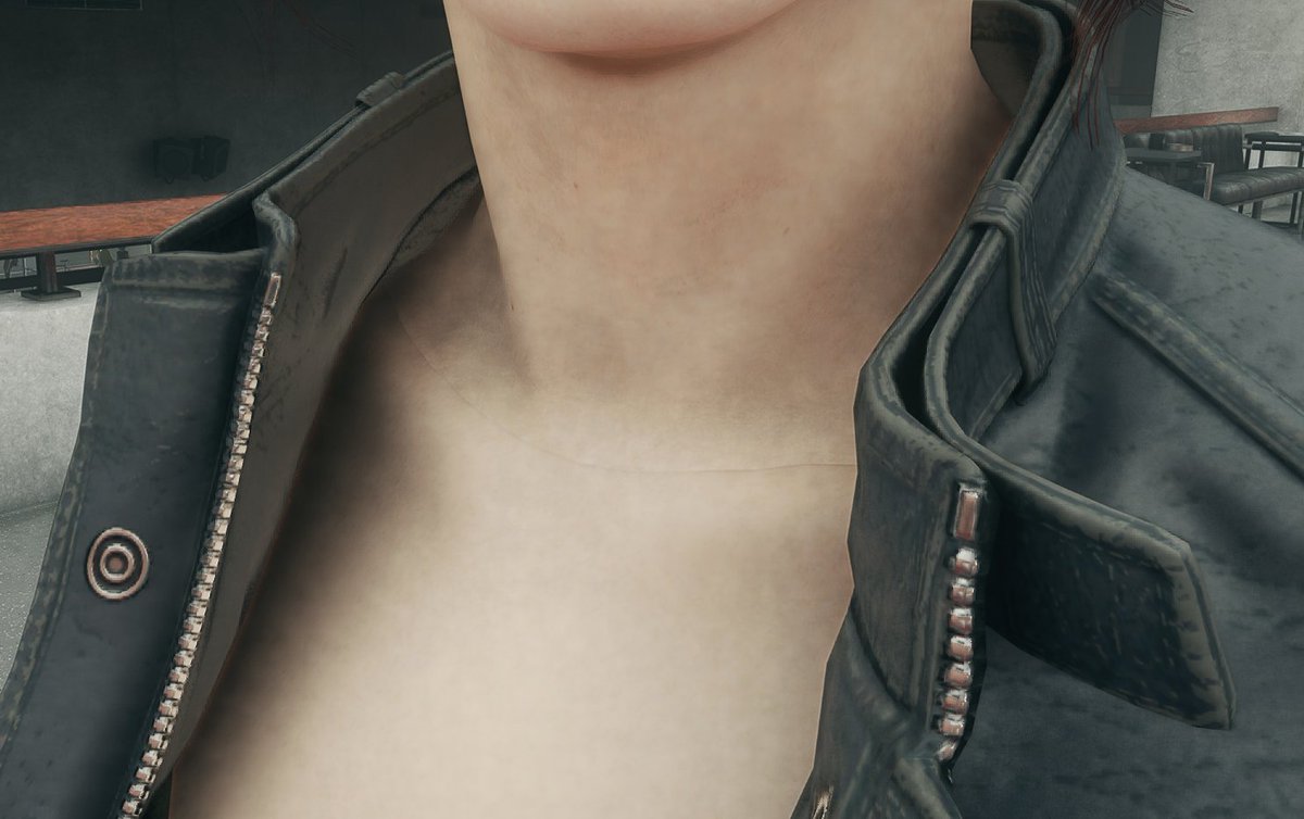 Oooh, this is a brave place to put a UV seam.They probably did this because getting an upper chest into a high quality character model with good facial animation would be a waste