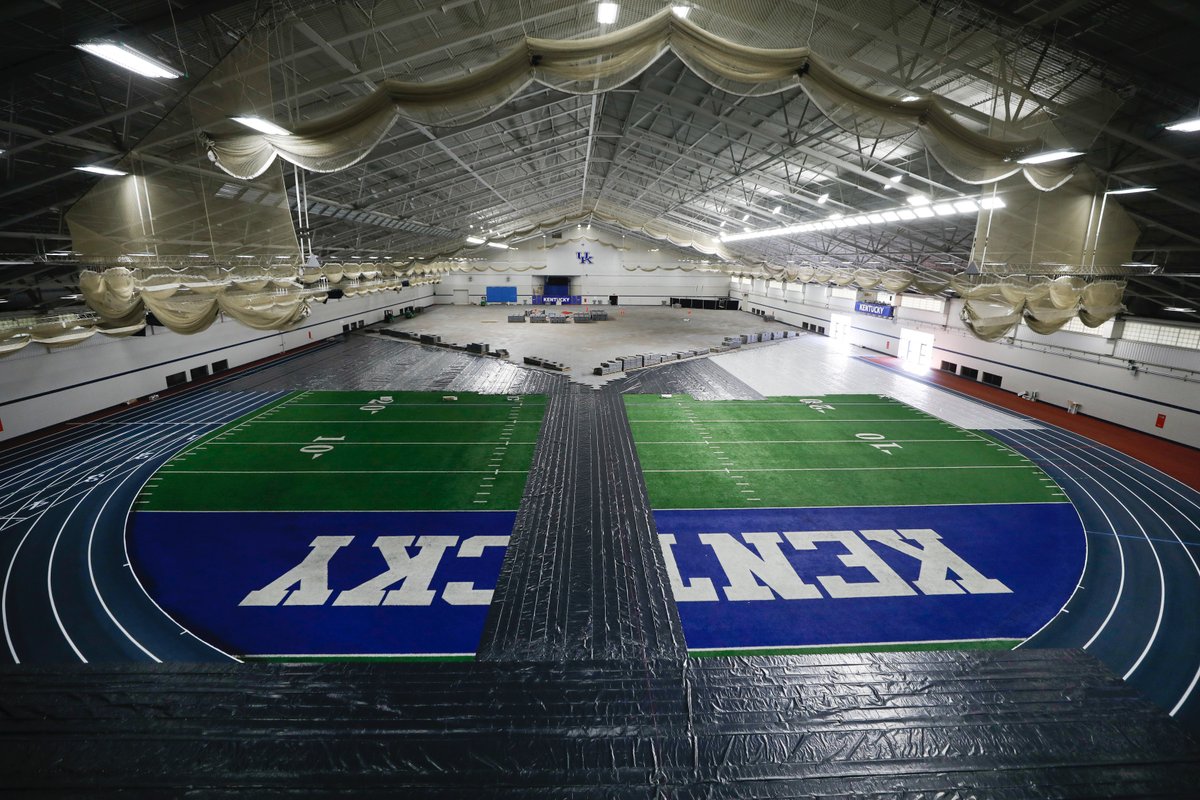 This was the scene inside UK's Nutter Field House yesterday as officials began transforming the athletic facility into a 400-bed field hospital to treat a potential overflow of COVID-19 patients. The construction will take two weeks. Photo by <a href="/markcornelison/">Mark Cornelison</a> | UKphoto