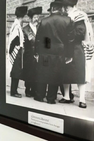 Hasid-watching has been a sport of sorts among some Outremont nationalists for a while. This is an older photograph by G. Proulx that hangs in my office. Caption: "Maybe we can change a bylaw!"(Proceeds went to charity so I'm OK owning it, karmically, as a reminder of sorts.)