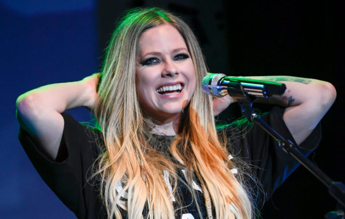 What is Avril Lavigne's Holy Trinity of albums?