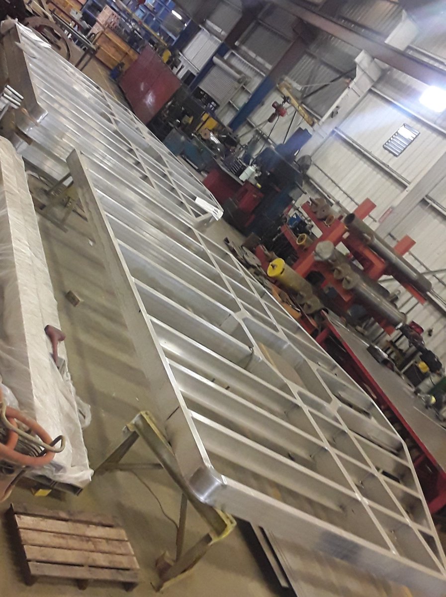aceworldcompany's tweet photo. We are here for our customers! We continue to keep working within the government guidelines. Today we are finishing up some welding on these aluminum platforms for a stacker crane. #stackercrane, #aluminum, #aceworldcompanies, #materialhandling https://t.co/alsiSBvTTZ