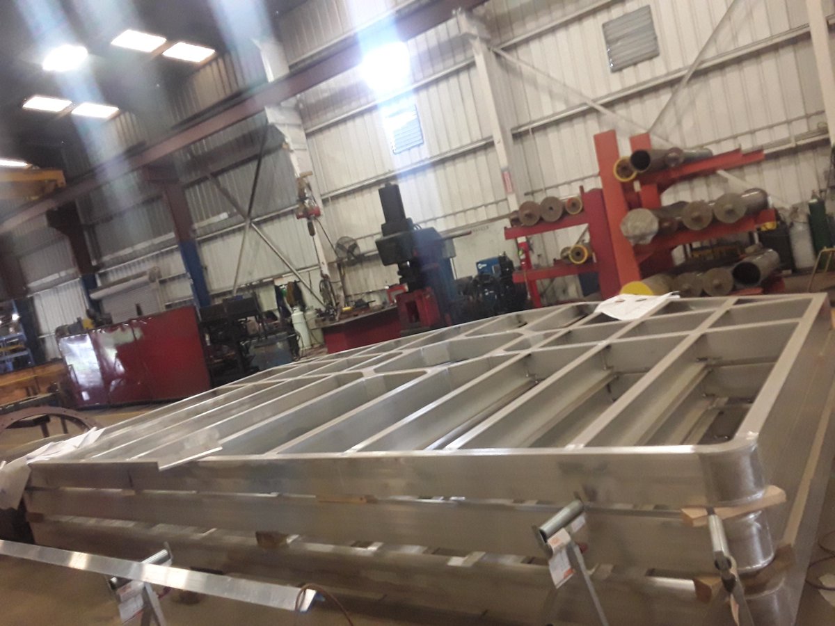 aceworldcompany's tweet photo. We are here for our customers! We continue to keep working within the government guidelines. Today we are finishing up some welding on these aluminum platforms for a stacker crane. #stackercrane, #aluminum, #aceworldcompanies, #materialhandling https://t.co/alsiSBvTTZ